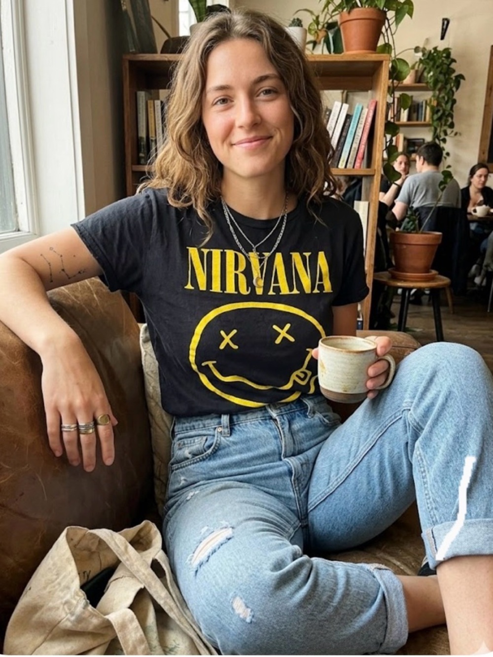 NIRVANA Black Tee with Yellow Smiley Graphic